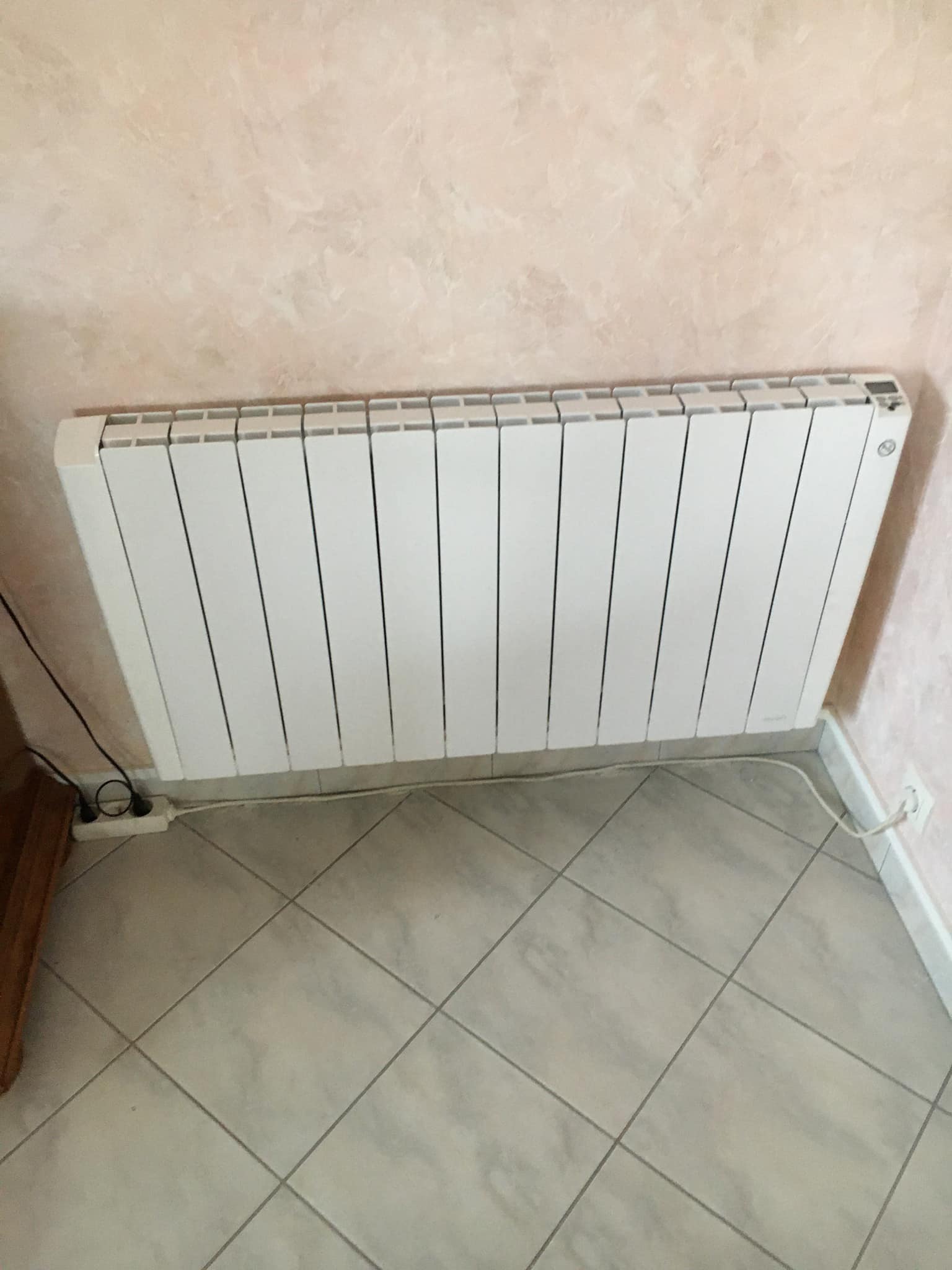 Radiateur à inertie posé par les professionnels de LG Habitat